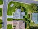 An aerial shot of the house showcasing its placement and lush surroundings at 2799 Privada Dr, The Villages, FL 32162