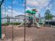A vibrant and colorful playground with swings and slides for endless fun at 29810 Anahid Dr, Leesburg, FL 34748