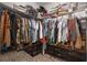 Spacious walk-in closet with ample hanging space, shelving, and storage solutions for an organized wardrobe at 29810 Anahid Dr, Leesburg, FL 34748