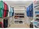 Organized walk-in closet with shelving at 3097 Bureau Path, The Villages, FL 32163