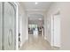 Bright foyer with tile flooring leading to an open-concept living space at 3097 Bureau Path, The Villages, FL 32163