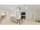 Bright living room with comfortable seating, tile floors, and a ceiling fan at 3097 Bureau Path, The Villages, FL 32163