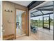Outdoor patio with seating, gazebo and a seamless transition to the interior of the house at 3097 Bureau Path, The Villages, FL 32163