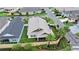 Aerial view of home featuring fenced yard and well-manicured lawn and landscaping at 3466 Smedley Rd, The Villages, FL 32163