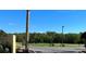 Beautiful golf course view with golfers, golf carts, and blue skies at 3466 Smedley Rd, The Villages, FL 32163