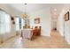 Elegant dining room with natural light, tile floors, and comfortable seating perfect for gatherings at 3547 Fairwaters Ct # F, Clermont, FL 34711