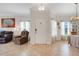 Inviting foyer with tile flooring, neutral tones, and ample natural light creates a warm welcome at 3547 Fairwaters Ct # F, Clermont, FL 34711