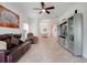 Cozy living room with a view into dining area at 3547 Fairwaters Ct # F, Clermont, FL 34711