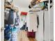 Organized walk-in closet featuring shelving, hanging rods, and ample storage containers at 3547 Fairwaters Ct # F, Clermont, FL 34711