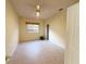 Light, airy bedroom with neutral walls, tile flooring, and a closet at 3555 Chapel Hill Blvd, Clermont, FL 34711