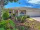 Charming single-story home with a well-manicured front yard and attached two-car garage, located in a lovely neighborhood at 3555 Chapel Hill Blvd, Clermont, FL 34711