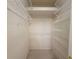 Spacious walk-in closet with ample shelving and carpeted floor at 3555 Chapel Hill Blvd, Clermont, FL 34711