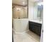 Bathroom featuring a glass enclosed shower and a vanity at 4002 Sw 158Th Street Rd, Ocala, FL 34473