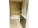 Bathroom featuring a tub with tile surround, a toilet, and a vanity with marble countertop at 4002 Sw 158Th Street Rd, Ocala, FL 34473