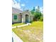 A charming single-story home featuring a well-manicured lawn and a welcoming entryway at 4002 Sw 158Th Street Rd, Ocala, FL 34473