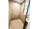 The tiled shower stall is a luxurious feature in the bathroom at 4002 Sw 158Th Street Rd, Ocala, FL 34473