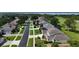An aerial view of the community with houses, golf course, and a glimpse of the lake at 4239 Fawn Meadows Cir, Clermont, FL 34711
