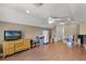 Spacious bonus room featuring a ceiling fan, wood flooring, and natural light at 4239 Fawn Meadows Cir, Clermont, FL 34711