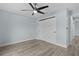 Cozy bedroom with ceiling fan and a closet at 472 Malauka Radl, Ocklawaha, FL 32179