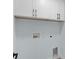 Functional laundry area with cabinetry and appliance connections at 472 Malauka Radl, Ocklawaha, FL 32179