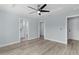 A well-lit Main Bedroom has an ensuite bathroom and ample closet space at 472 Malauka Radl, Ocklawaha, FL 32179