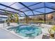 Inviting pool area with comfortable seating and a peaceful waterfront view, perfect for outdoor living at 4878 Chitty Chatty Run, The Villages, FL 32163