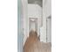 Welcoming entryway featuring wood-look tile floors leading to the living spaces with neutral paint at 5107 Marshelder St, Apopka, FL 32712