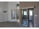Bright and airy living area with tile flooring, large windows, and slider to a potential outdoor space at 5436 Astor St, Leesburg, FL 34748