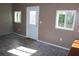 Enclosed patio space with tile flooring, natural light, and access to the outdoors at 5436 Astor St, Leesburg, FL 34748