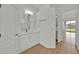 Bright bathroom with white cabinets and modern lighting at 5556 Vintage View Blvd, Lakeland, FL 33812