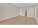 Bright bedroom with tray ceiling and access to ensuite bathroom at 5556 Vintage View Blvd, Lakeland, FL 33812