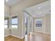 Bright living room with a wall of windows and recessed lighting at 5556 Vintage View Blvd, Lakeland, FL 33812