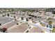 Neighborhood aerial showcasing the community layout, lush landscaping, and proximity to the golf course at 579 Audrey Ln, The Villages, FL 32162