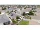 Aerial of a home with solar panels, fenced yard, and patio enhancing outdoor living space at 579 Audrey Ln, The Villages, FL 32162
