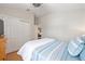 Bedroom featuring a closet, a ceiling fan, and neutral walls at 579 Audrey Ln, The Villages, FL 32162