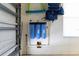 Garage featuring a water filtration system, enhancing the home's overall functionality and value at 579 Audrey Ln, The Villages, FL 32162
