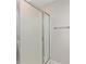 Framed shower with seamless glass doors and chrome hardware at 579 Audrey Ln, The Villages, FL 32162