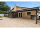 Cozy back patio with shade and brick pavers, ideal for relaxing or entertaining at 721 Mendoza Dr, Orlando, FL 32825