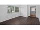 Bright bedroom boasts natural light, wood floors, and ample closet space at 721 Mendoza Dr, Orlando, FL 32825
