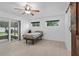 Bright bedroom with modern windows and sliding door access to the backyard at 721 Mendoza Dr, Orlando, FL 32825