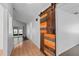 Hallway featuring rustic barn door leads to a living space with a pool view at 721 Mendoza Dr, Orlando, FL 32825
