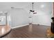 Open concept living room with high ceilings, hardwood floors and entry access at 721 Mendoza Dr, Orlando, FL 32825