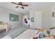 Bright bedroom featuring a ceiling fan and neutral tones, creating a calm and inviting atmosphere at 7350 Spring Mountain Ln, Yalaha, FL 34797