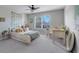 Bedroom features a bed with stuffed animals, desk with chair, and large window at 7350 Spring Mountain Ln, Yalaha, FL 34797