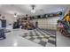 Spacious garage with organized storage solutions, ample room for vehicles and projects at 7350 Spring Mountain Ln, Yalaha, FL 34797