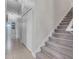 Hallway features tile floors, closet, stairs and a view to the bathroom at 7350 Spring Mountain Ln, Yalaha, FL 34797