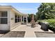 Back patio with table, chairs and barbecue at 8377 Se 177Th Bartram Loop, The Villages, FL 32162