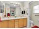 Bathroom features double sinks, modern fixtures, and neutral color palette at 8377 Se 177Th Bartram Loop, The Villages, FL 32162
