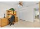 Bedroom featuring a functional built-in desk with a comfortable office chair at 8377 Se 177Th Bartram Loop, The Villages, FL 32162