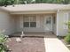 Welcoming front porch with decorative elements, perfect for enjoying a quiet moment outdoors at 8377 Se 177Th Bartram Loop, The Villages, FL 32162